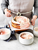 Rose Petal Cake - spreading the cake with cream
