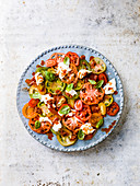 Tomato salad with burrata and warm nduja dressing