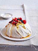 Pavlova with berries and passionfruit