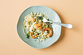 Zoodles with prawns in a creamy lemon sauce (keto cuisine)