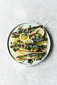Israeli mackerel in lemon sauce with pine nuts