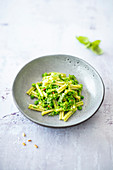 Pasta with pea puree, basil and pine nuts (vegan)