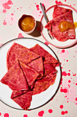 Beetroot crepes with apple sauce