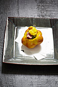 L'ambrogina (saffron roll filled with savoy cabbage and sausage, Italy)