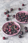 Fresh cherries on plates