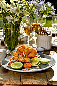 Panko and coconut prawns with pineapple on bamboo skewers