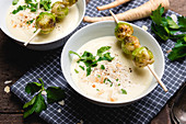 Vegan parsnip cream soup with roasted Brussels sprouts