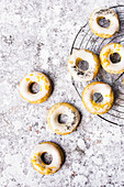 Lemon And Poppyseed Doughnuts With A Lemon Icing And Zest