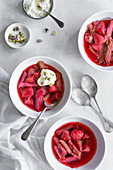 Stewed rhubarb and strawberries served in bowls