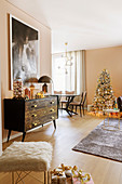 Elegant living room decorated in champagne and gold at Christmas