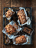 Small Christmas cakes with caramel sauce and hazelnuts