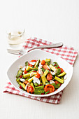 Spicy zucchini and tomato vegetables with ricotta