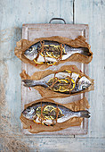 Whole sea bream cooked en papillote