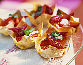 Filo pastry baskets with cream filling and strawberries