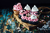 Halloween cupcakes and eclairs