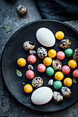 Easter eggs with chocolate candies