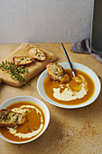 Squash soup with thyme, cream and cheese croutons