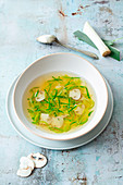 Consommé with mushrooms, leek and pearl sago