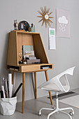 Modern writing desk and white designer chair