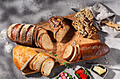 A bread buffet on a chopping board