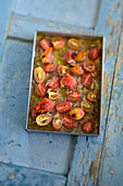 Roasted tomatoes with onions in olive oil
