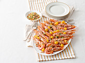 King prawns with pine nut gremolata and yellow cherry tomatoes