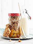 Granola with mango and passion fruit in a jar