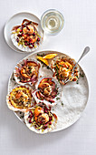 Roasted scallops with fruit, herbs and vegetables