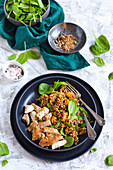 Dietary chicken porridge with sweet potatoes and spinach on a plate
