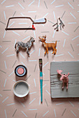 Craft utensils for making coat rack with hooks made from animal figurines