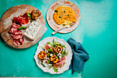 Milanese risotto, grilled peach salad and prosciutto with gorgonzola