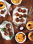 Meatballs with mustard and small gratins