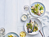 Marinated mackerel with green olive and celery dressing