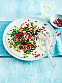 Lemon roast vegetables with yogurt tahini and pomegranate