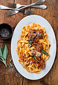 Ribbon pasta with pumpkin meatballs and sage