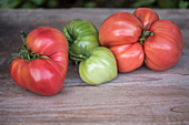 Heritage tomato varieties on a wooden board