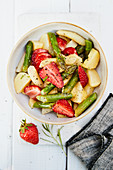 Potato salad with asparagus and strawberries