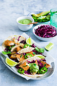 Fried fish tacos with guacamole sauce