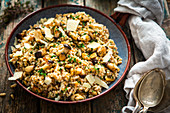 Spelt rice with mushrooms, parmesan and herbs