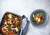 Nduja-baked hake with chickpeas, mussels and gremolata
