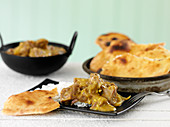 Indian beef curry with naan bread
