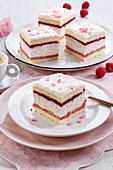 Foam cake with raspberry mousse and cream