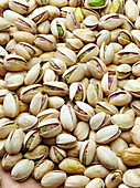 Pistachio nuts with shells (filling the picture)