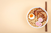 Top view of Japanese noodle soup ramen in white bowl