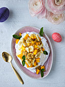 Pavlova with exotic fruit for Easter