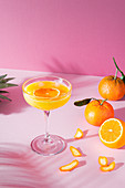 Orange cocktail in a tall stem glass