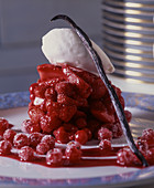 Red fruits with vanilla ice cream