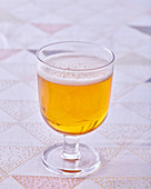 A glass of cider
