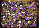 Purple vegetables on roasting pan