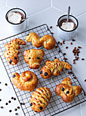 Animal-shaped bread for children and hot chocolate